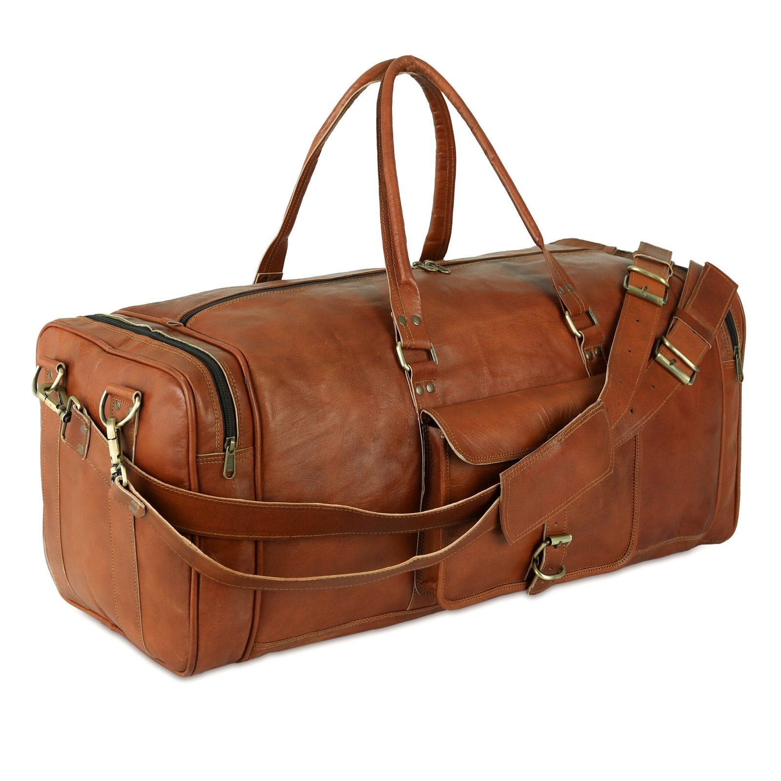 A vintage brown leather duffle bag with brass hardware, two handles, and an adjustable shoulder strap.